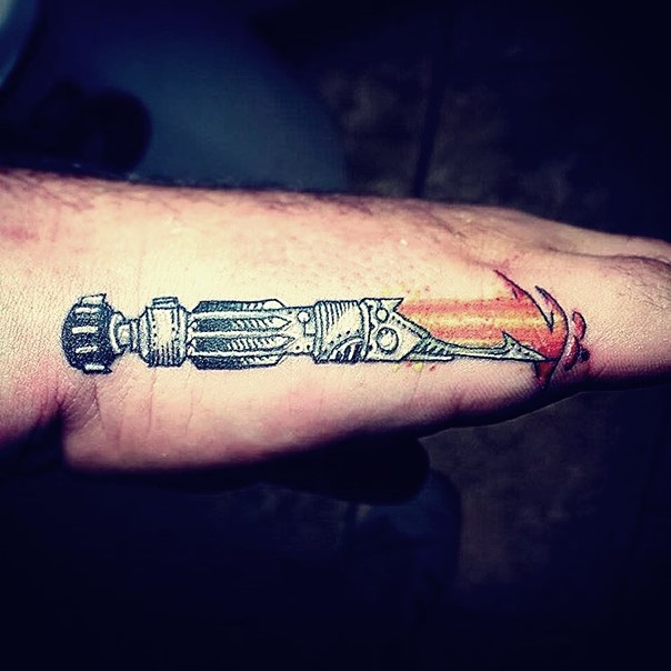 Old school style colored detailed lightsaber tattoo on hand