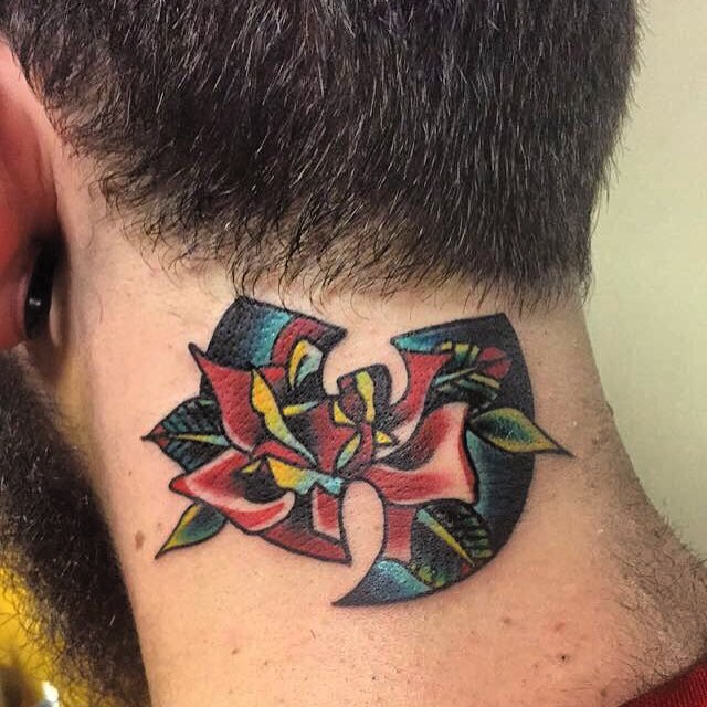 Old school style colored flower tattoo on neck