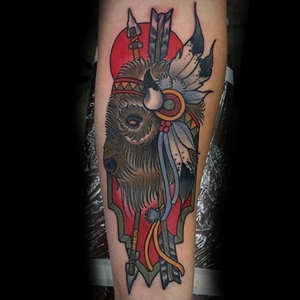 Old school style colored forearm tattoo of Indian bull and arrows