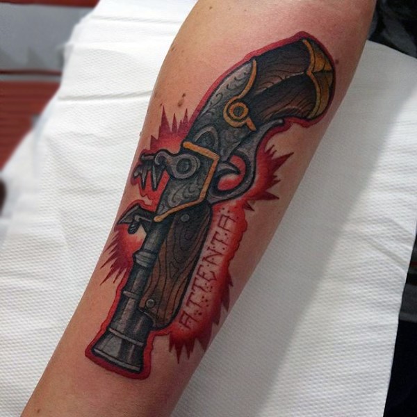 Old school style colored forearm tattoo of antic pistol and lettering