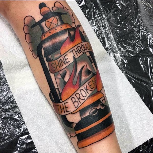 Old school style colored gas lamp tattoo with banner lettering