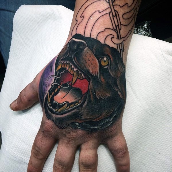 Old school style colored hand tattoo of evil dog