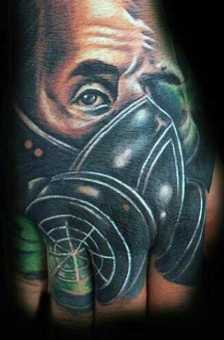 Old school style colored hand tattoo of man in gas mask