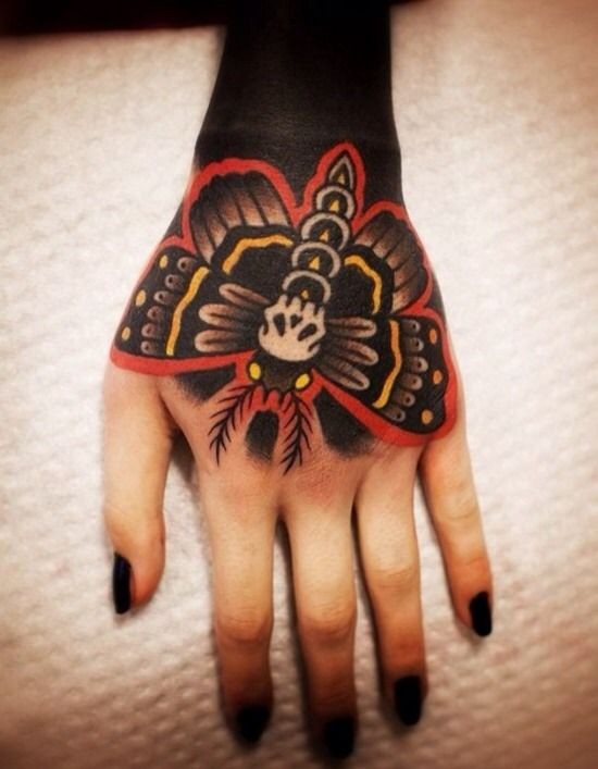 Old school style colored hand tattoo of cool butterfly
