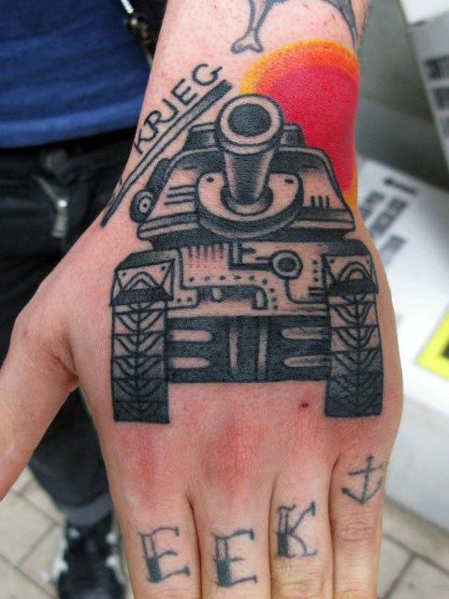 Old school style colored hand tattoo of big tank with lettering