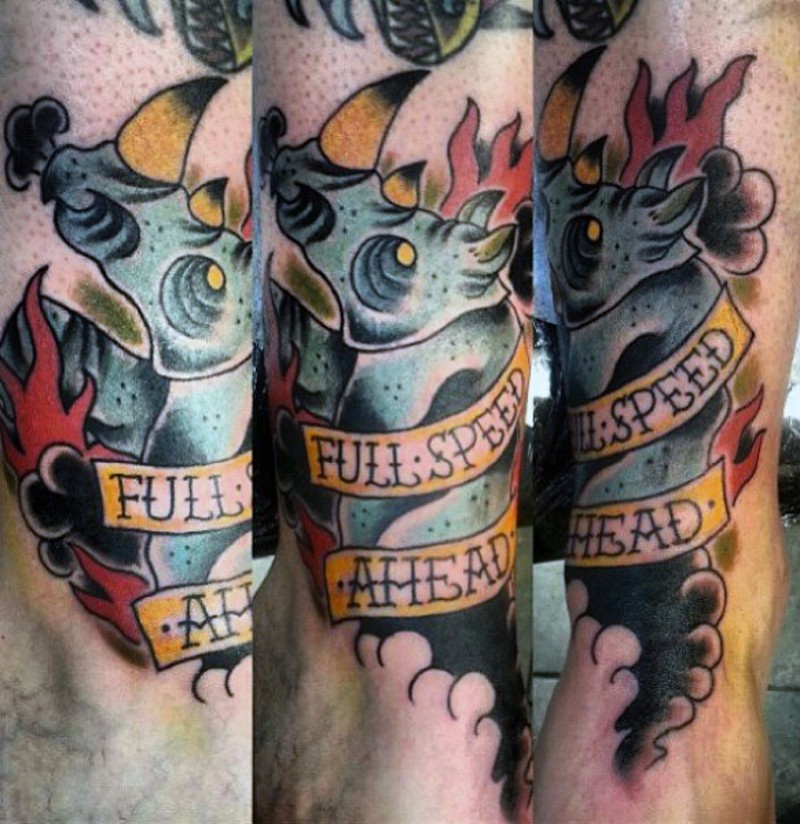 Old school style colored leg tattoo of rhino with lettering and flames
