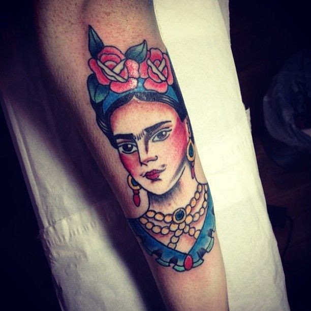 Old school style colored leg tattoo of woman portrait