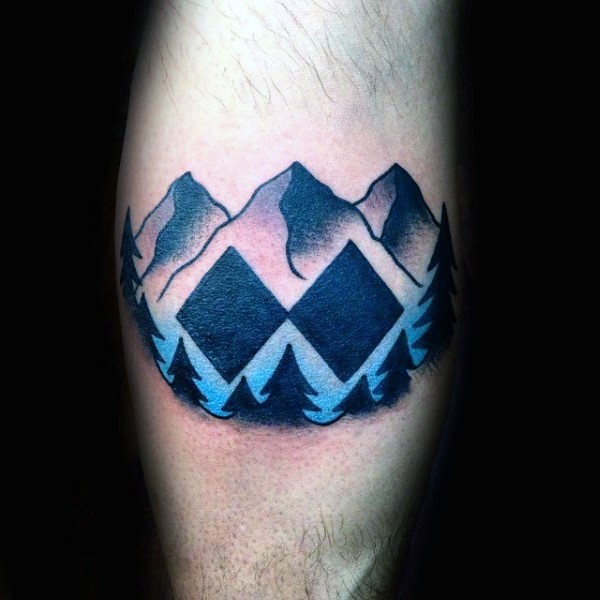 Old school style colored leg tattoo of mountains with geometrical figures