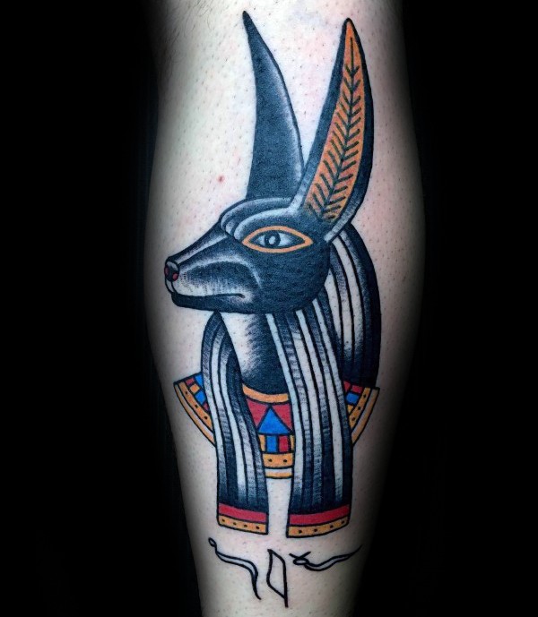 Old school style colored leg tattoo of Egypt Anubis God