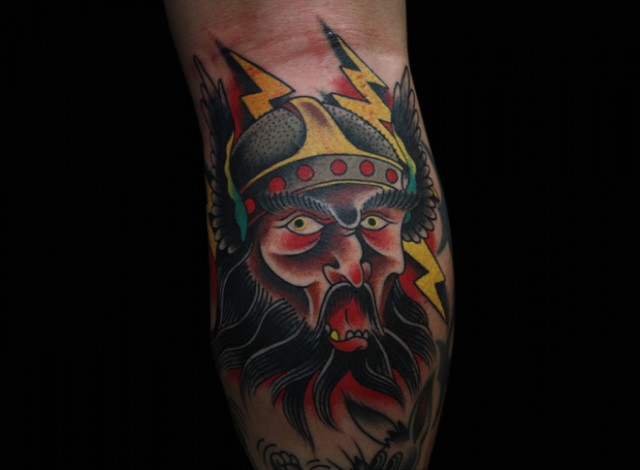 Old school style colored leg tattoo of fantasy warrior
