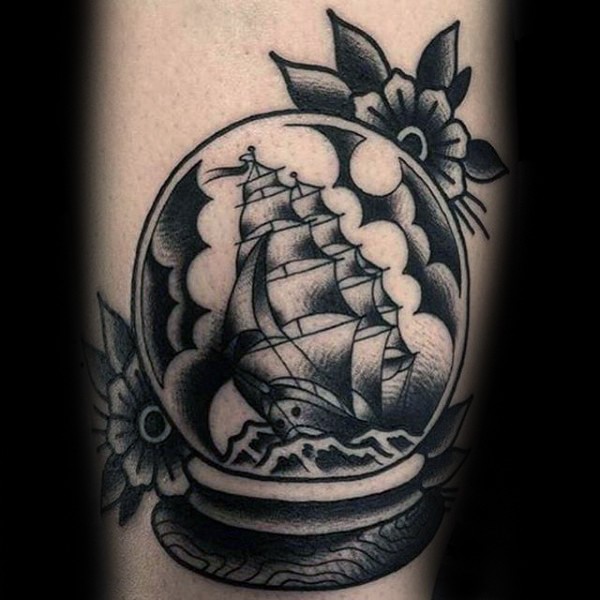 Old school style colored magical orb with ship and flowers tattoo