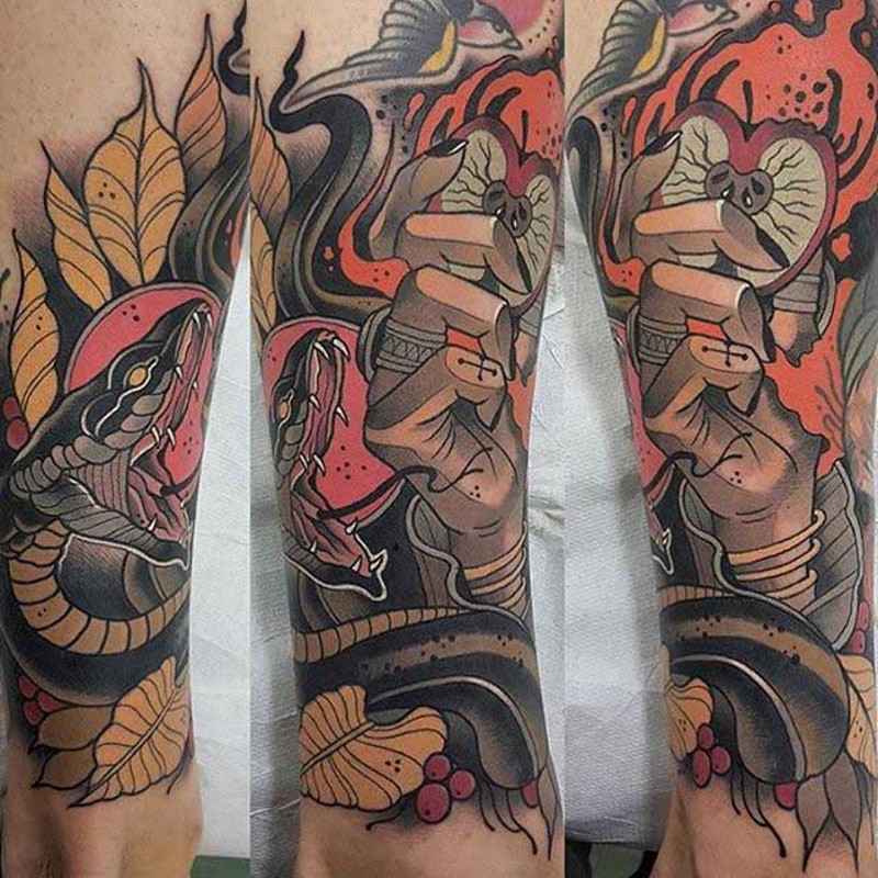 Old school style colored mystical hand with apple half tattoo on leg combined with evil snake