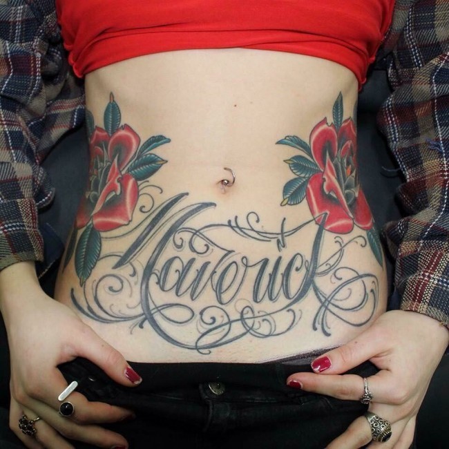 Old school style colored roses tattoo on belly with lettering