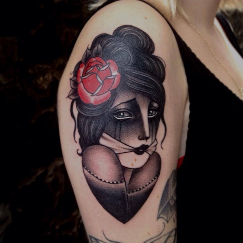 Old school style colored shoulder tattoo of scared woman with tied mouth and rose