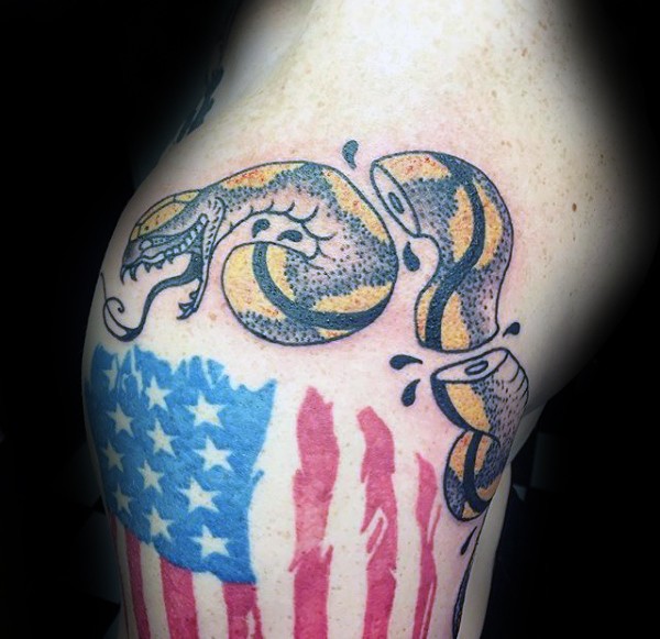 Old school style colored shoulder tattoo of join or die like ripped snake with flag