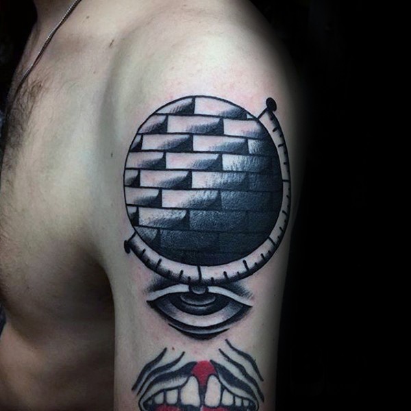 Old school style colored shoulder tattoo of stone like globe