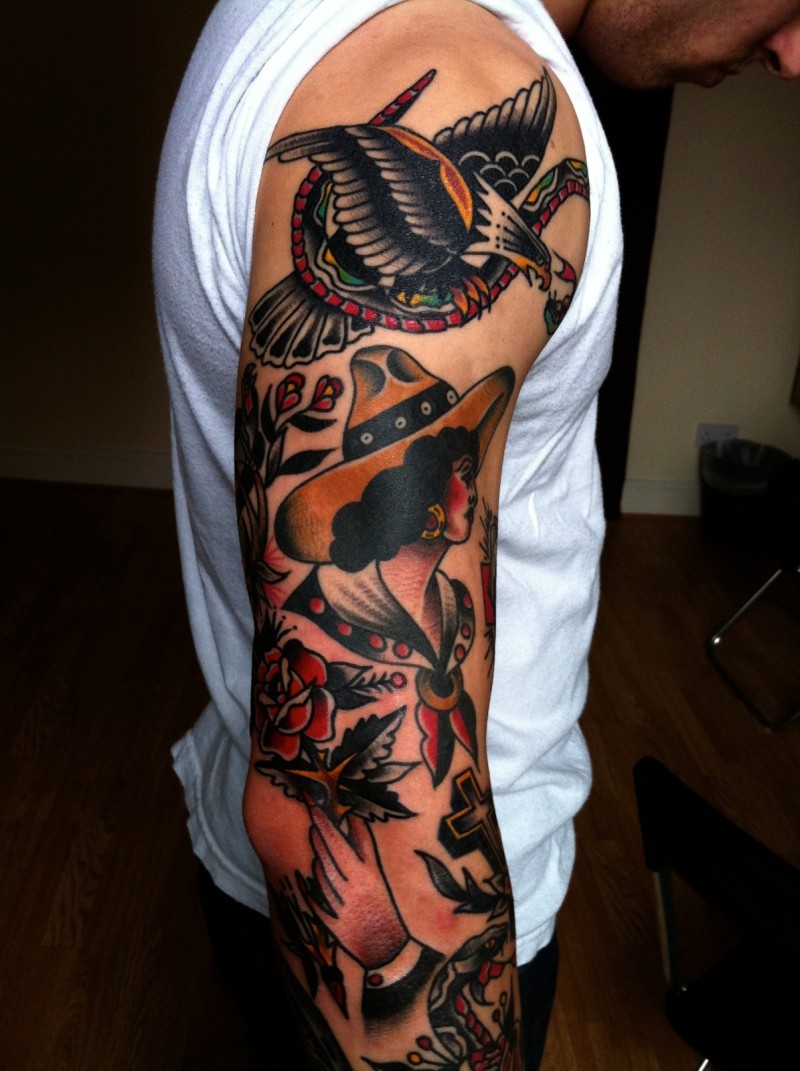 Old school style colored sleeve tattoo of Mexican woman with eagle and flower