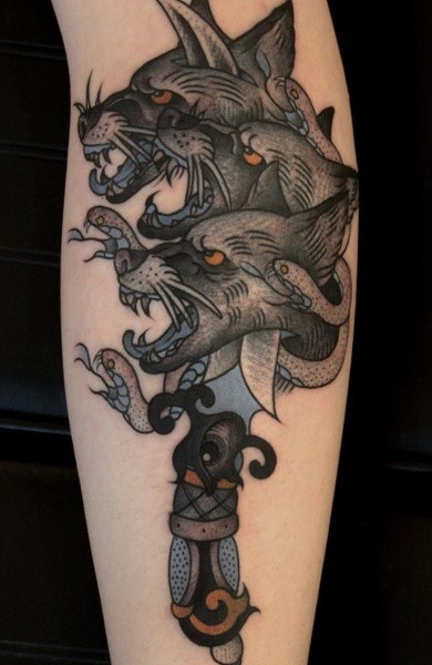 Old school style colored tattoo of Cerberus with snake and dagger