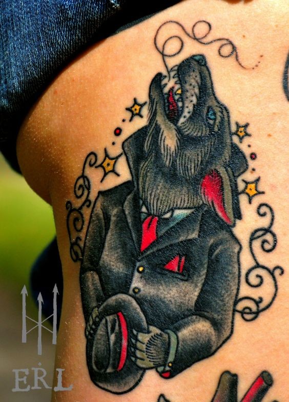 Old school style colored thigh tattoo of colored wolf in suit