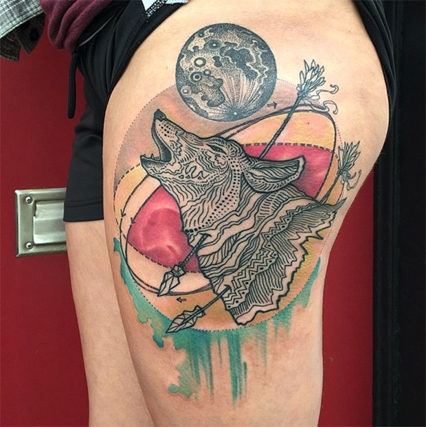 Old school style colored thigh tattoo of wolf with arrows and moon by Dino Nemec