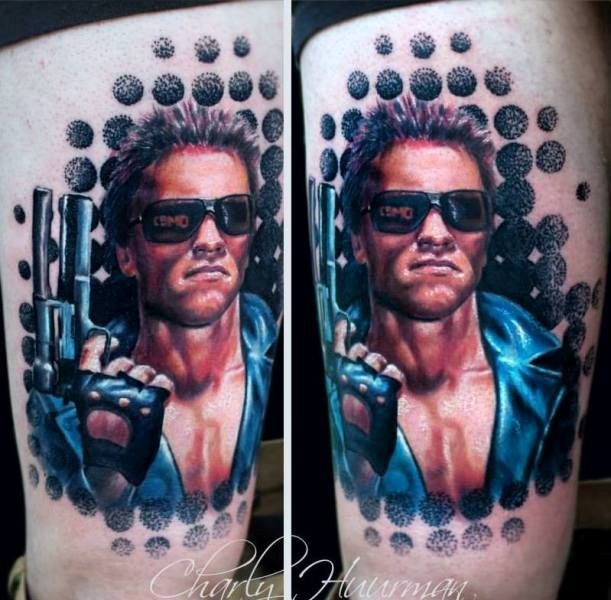 Old school style colored thigh tattoo of Terminator