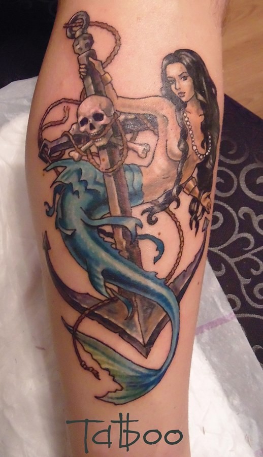 Old school style designed and colored forearm tattoo of seductive mermaid with anchor