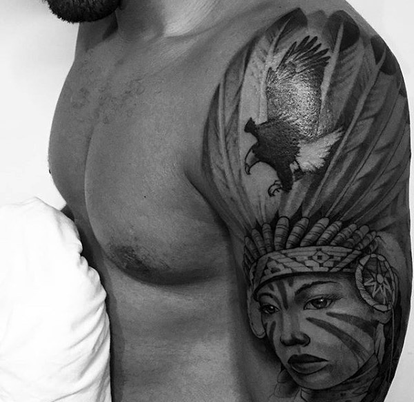 Old school style detailed black and white Indian woman tattoo on shoulder with egale