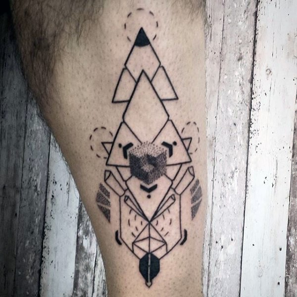Old school style leg tattoo of various geometrical ornaments