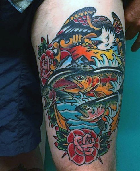 Old school style painted and colored fishes tattoo on thigh