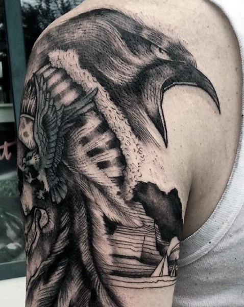 Old school style painted black ink eagle like bird tattoo on arm