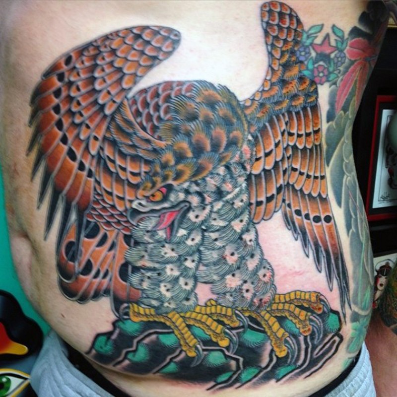 Old school style painted colorful side tattoo of big eagle