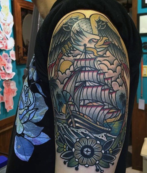 Old school style painted multicolored nautical tattoo on half sleeve area