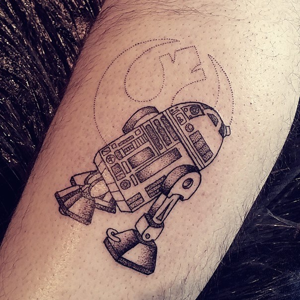 Old school style simple black ink forearm tattoo of R2D2
