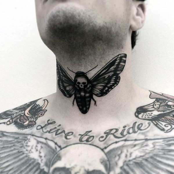Old school style small black ink night butterfly tattoo on neck