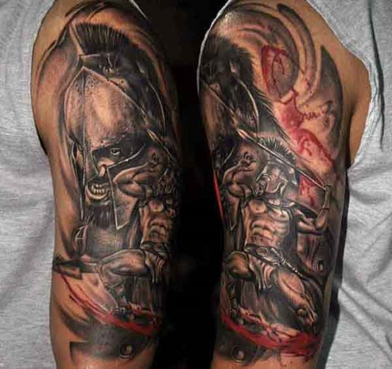 Old style black and white angry Spartan warrior tattoo on upper arm