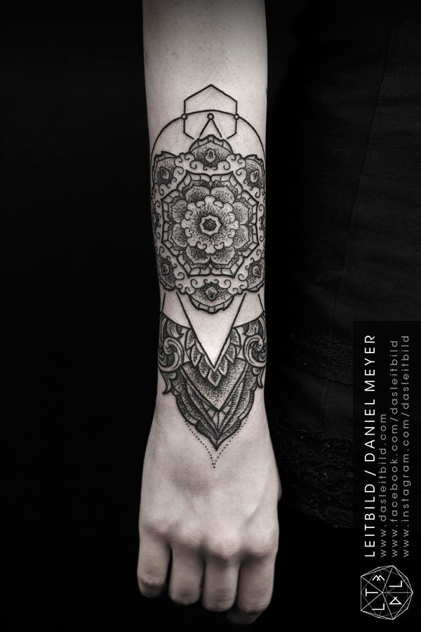 Old style black and white flower shaped wrist armor tattoo