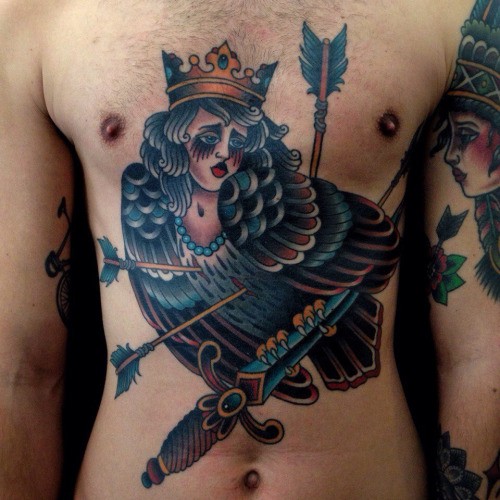 Old  style colored chest and belly tattoo of eagle with arrows stylized with woman head