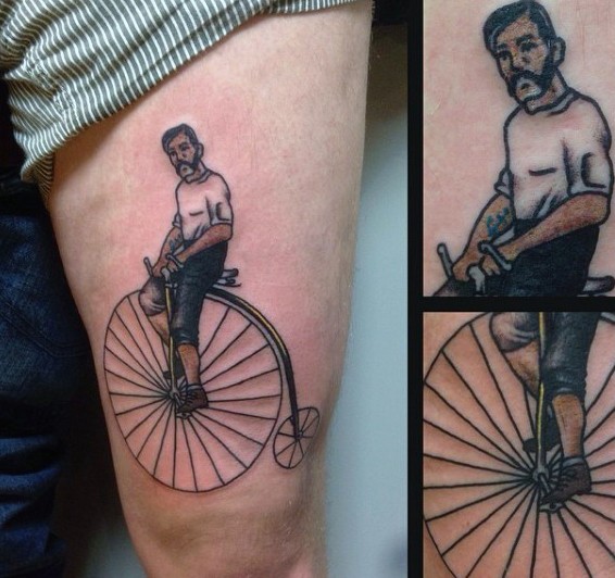 Old style colored cyclist on high wheeler thigh tattoo