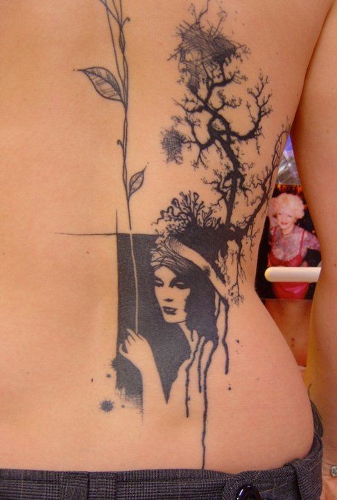 Original abstract style black and white sad woman with tree tattoo on waist