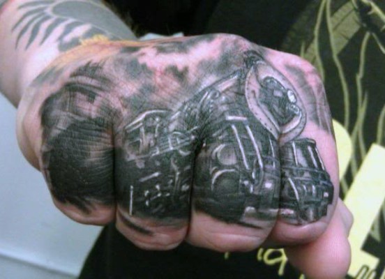 Original black and white big old train tattoo on fist