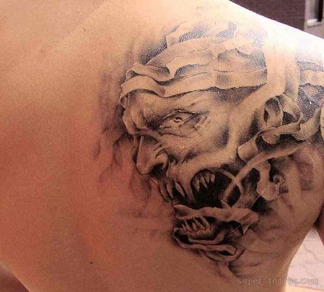 Original black and white detailed monster mummy tattoo on shoulder