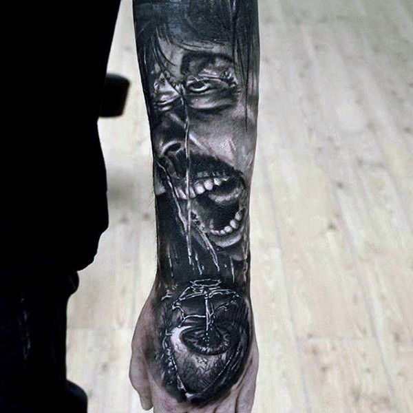 Original black ink crazy man portrait tattoo on sleeve