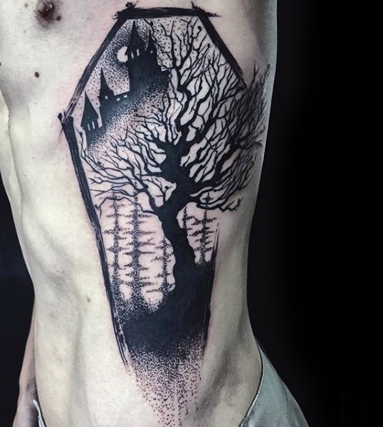 Original coffin shaped black ink side tattoo stylized with old castle and dark tree