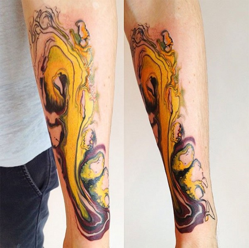 Original colored little abstract tattoo on arm