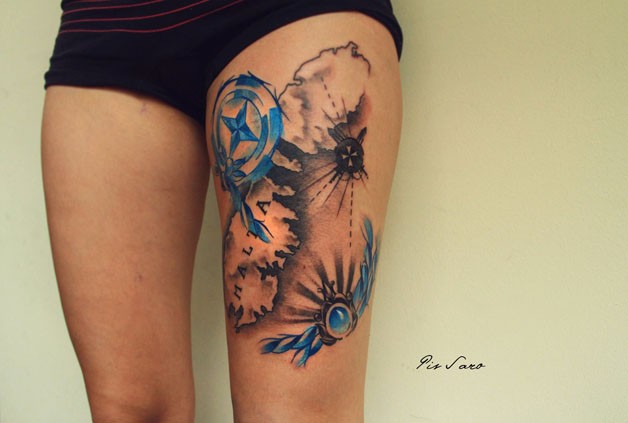 Original combined and colored thigh tattoo of map with compass