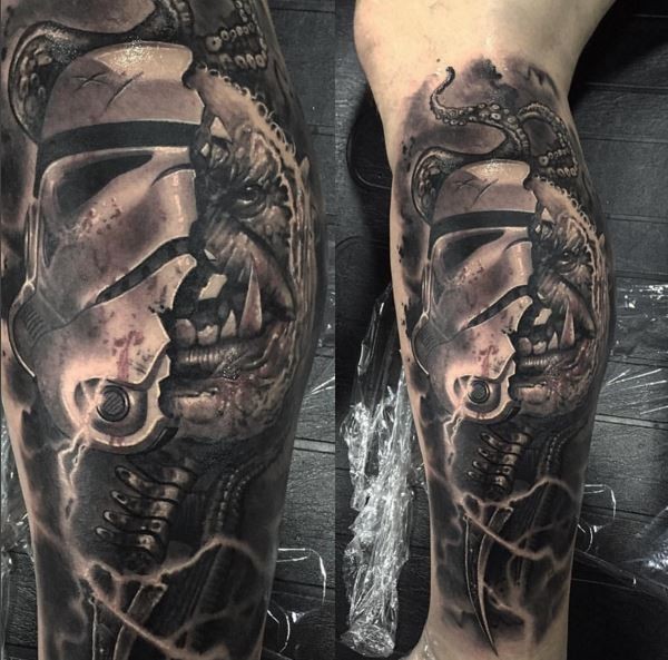 Original combined black ink arm tattoo of Storm troopers helmet with tribal man