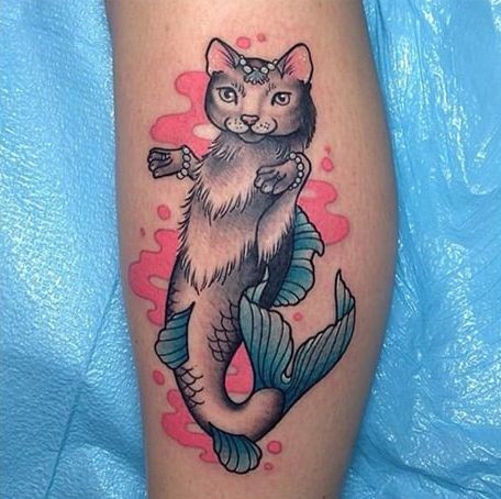 Original combined colored leg tattoo of half cat half fish
