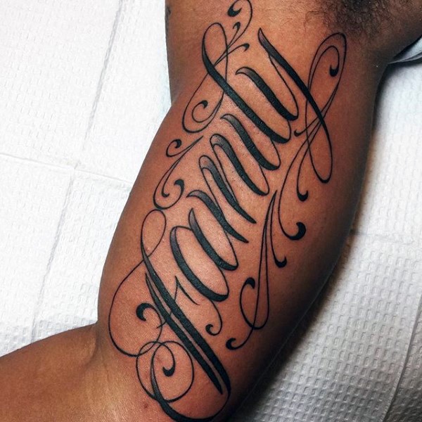 Original design lettering family tattoo on biceps