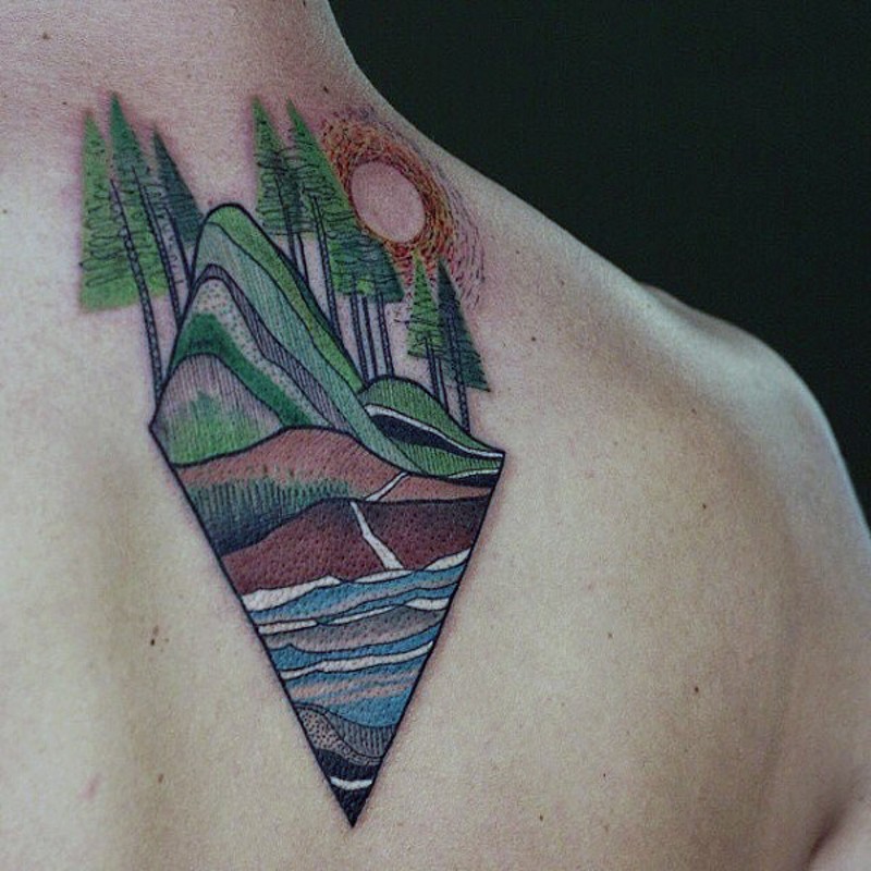 Original designed and painted colored mountain forest tattoo on upper back