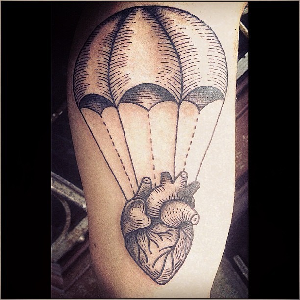 Original designed black ink human heart tattoo combined with parachute